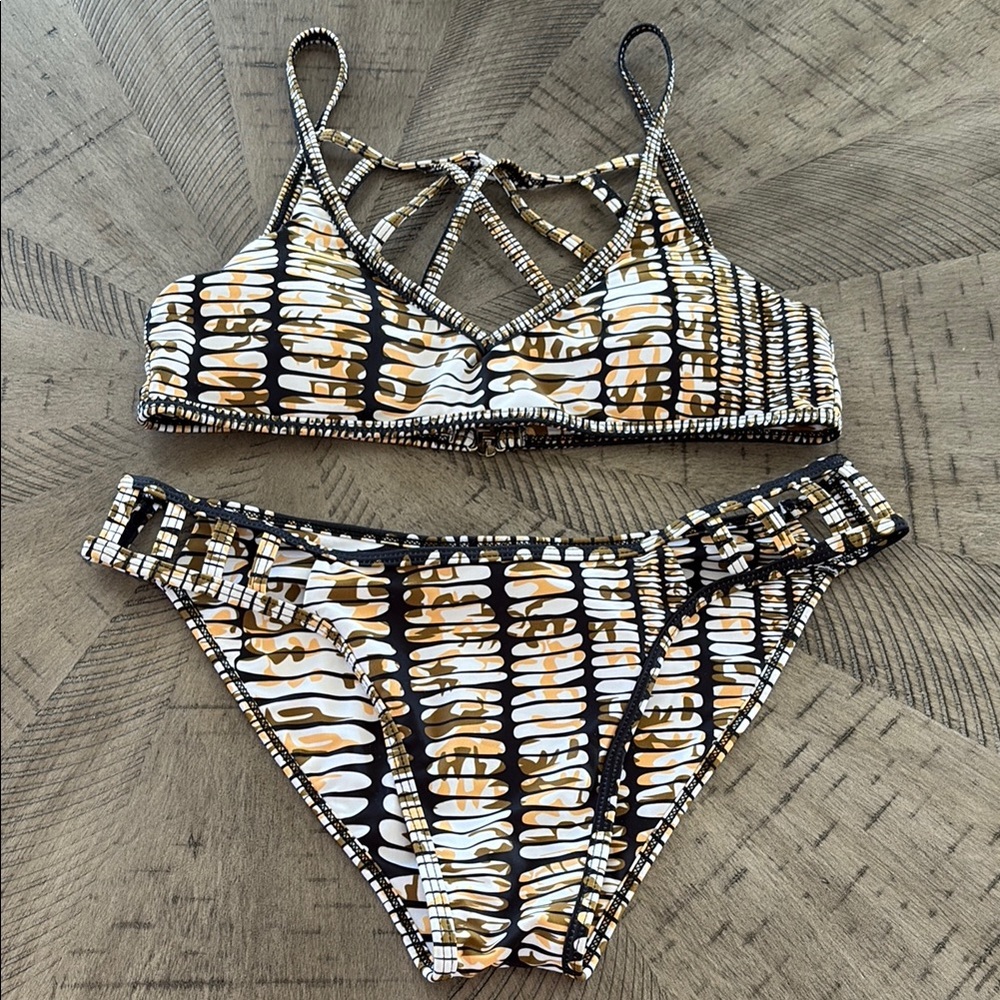 Elegant Black and Gold Bikini with Sporty Bralette